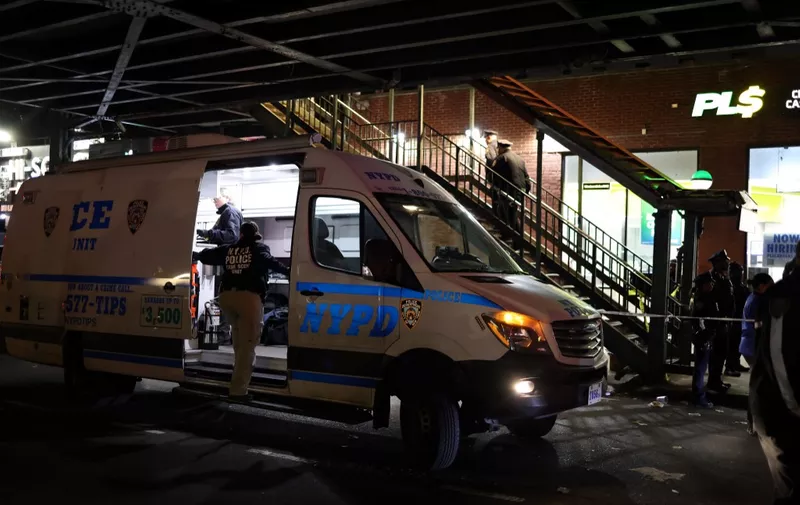 Police are seen at the Mt. Eden Avenue subway station in the Bronx borough of New York after six people were injured with one person in critical condition following a shooting at the subway station on February 12, 2024. Authorities were alerted just after 4:30 pm (2130 GMT) and one patient in a critical condition was taken to the hospital, as were four people in serious condition and one with minor injuries, the fire department said. No motive was given for the shooting. (Photo by CHARLY TRIBALLEAU / AFP)