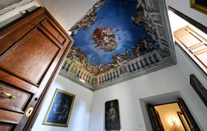 This photograph taken on January 18, 2022, shows the ceiling painted by Giovanni Luigi Valesio in the Casino dell'Aurora inside the Villa Boncompagni Ludovisi. - The Roman villa housing the only mural by Caravaggio failed to find a bidder in an auction on January 18, 2022 sparked by a dispute between its heirs. The sprawling Casino dell'Aurora will be put up for sale again in April, with the base price of 471 million euros ($534 million) lowered by about 20 percent, according to the notary involved in the sale. (Photo by Riccardo Antimiani / ANSA / AFP) / Italy OUT