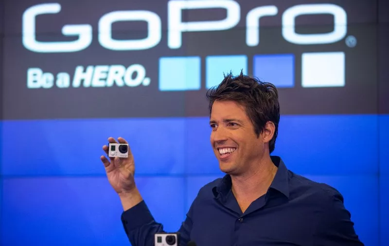 NEW YORK, NY - JUNE 26: Nick Woodman, founder and CEO of GoPro speaks during the company's initial public offering (IPO) at the Nasdaq Stock Exchange on June 26, 2014 in New York City. GoPro's small, cheap video cameras, which can be mounted to capture unique points of view and record in high definition, have seen a surge in use for capturing everything from extreme sports to personal moments.   Andrew Burton/Getty Images/AFP