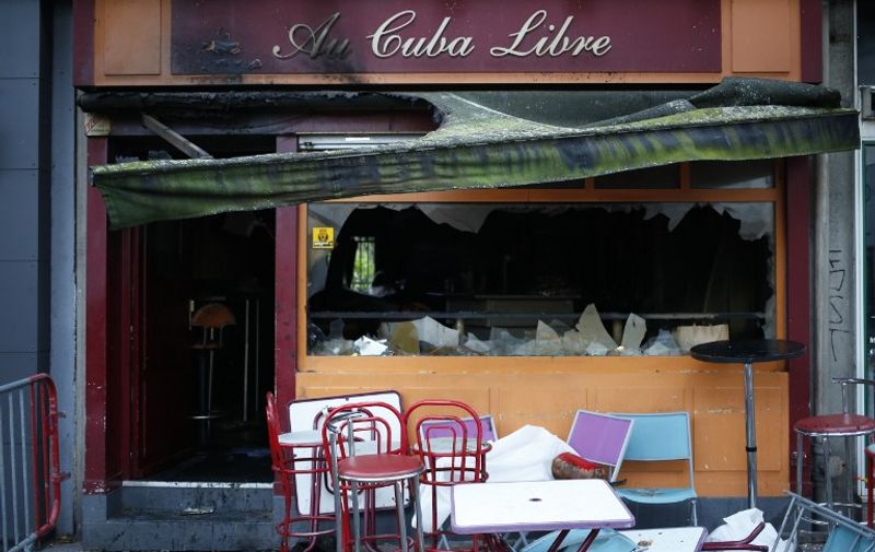 A picture taken on August 6, 2016 shows the damaged Au Cuba Libre bar after a fire in Rouen. 
At least 13 people were killed and six injured in a fire during a birthday party at a bar in the northern French city of Rouen, officials said. / AFP PHOTO / MATTHIEU ALEXANDRE