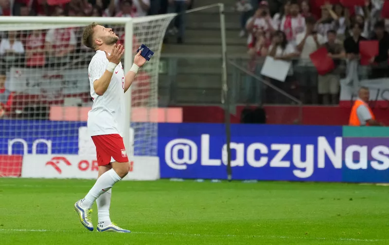 Poland' Jakub Blaszczykowski reacts during the international friendly soccer match between Poland and Germany at the Narodowy stadium in Warsaw, Poland, Friday, June 16, 2023. (AP Photo/Czarek Sokolowski)