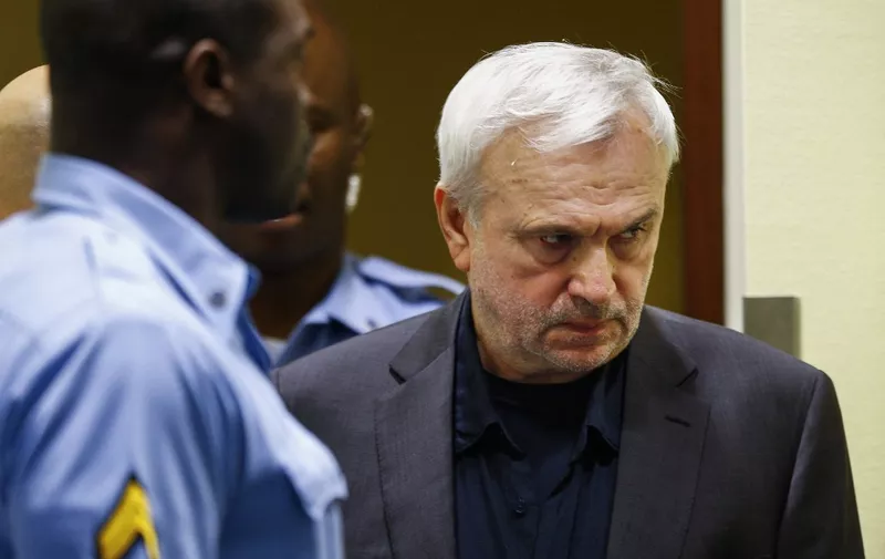 EDITORS NOTE: Graphic content / Former Serbian intelligence chief Jovica Stanisic appears in court as he goes back on trial before a UN court in The Hague on June 13, 2017 at the United Nations Mechanism for International Criminal Tribunal, accused of running death squads that terrorised Bosnia and Croatia in the bloody 1990s Balkans wars. (Photo by Michael Kooren / ANP / AFP) / Netherlands OUT