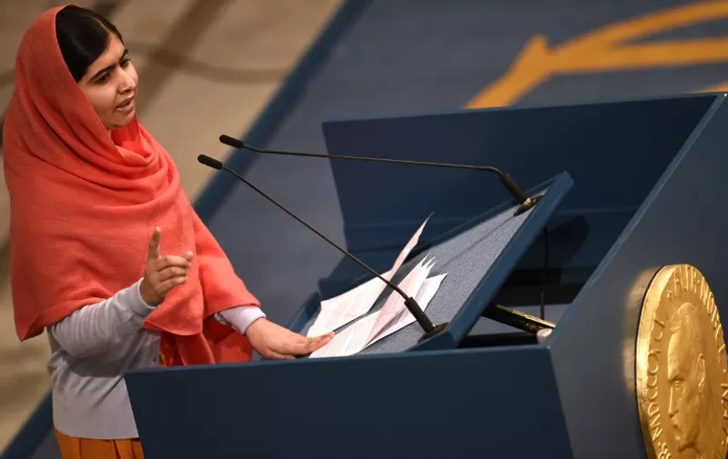 Nobel Peace Prize laureate  Malala Yousafzai  delivers her speech during the Nobel Peace Prize awarding ceremony at the City Hall in Oslo on December 10, 2014.  The 17-year-old Pakistani girls' education activist Malala Yousafzai known as Malala shares the 2014 peace prize with the Indian campaigner Kailash Satyarthi, 60, who has fought for 35 years to free thousands of children from virtual slave labour.
AFP PHOTO / ODD ANDERSEN