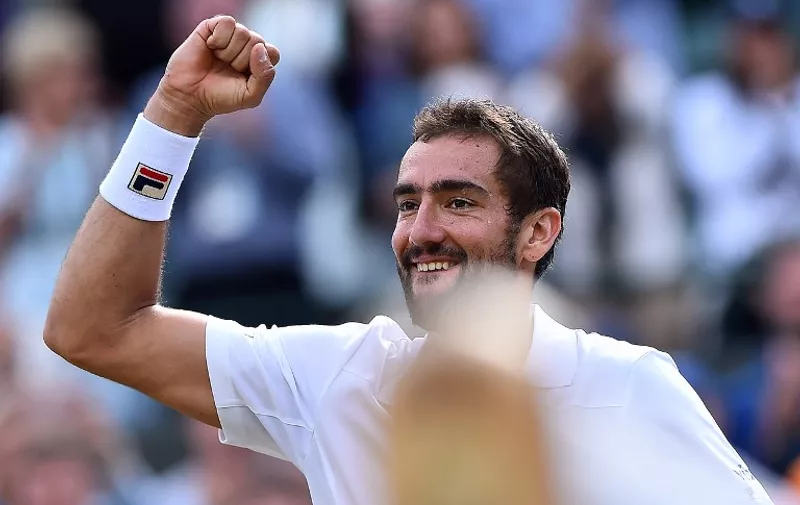 Croatia's Marin Cilic reacts after winning against Luxembourg's Gilles Muller during their men's singles quarter-final match on the ninth day of the 2017 Wimbledon Championships at The All England Lawn Tennis Club in Wimbledon, southwest London, on July 12, 2017.
Cilic won the match 3-6, 7-6, 7-5, 5-7, 6-1. / AFP PHOTO / Glyn KIRK / RESTRICTED TO EDITORIAL USE