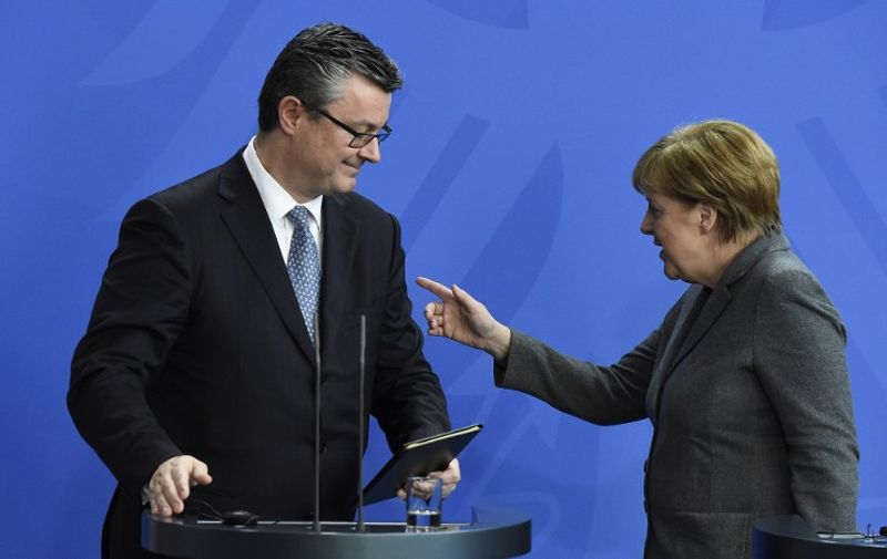 German Chancellor Angela Merkel (R) and Croatian Prime Minister Tihomir Oreskovic give a news conference following talks in Berlin on March 1, 2016. / AFP / TOBIAS SCHWARZ