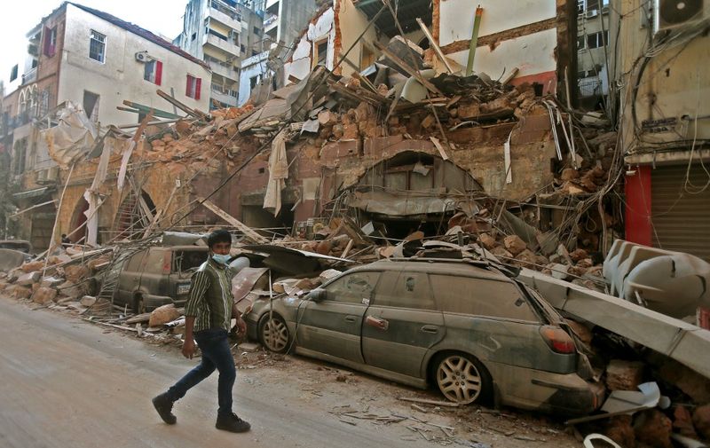 A picture shows the aftermath of a blast that tore through Lebanon's capital on August 5, 2020 in Beirut. - Rescuers searched for survivors in Beirut after a cataclysmic explosion at the port sowed devastation across entire neighbourhoods, killing more than 100 people, wounding thousands and plunging Lebanon deeper into crisis. The blast, which appeared to have been caused by a fire igniting 2,750 tonnes of ammonium nitrate left unsecured in a warehouse, was felt as far away as Cyprus, some 150 miles (240 kilometres) to the northwest. (Photo by STR / AFP)