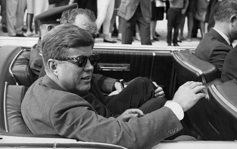 John F. Kennedy, rides in a convertible as he leaves the tarmac at MacDill Air Force Base in Tampa on November 19, 1963, just days before his assasination. (Credit Image: Tampa Bay Times/ZUMAPRESS.com)