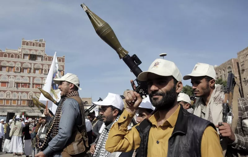 SANAA, YEMEN - FEBRUARY 28: Houthis who completed their military training successfully march with heavy weapons and chant slogans in support of Palestinians within their graduation ceremony in Sanaa, Yemen on February 28, 2024. Mohammed Hamoud / Anadolu (Photo by Mohammed Hamoud / ANADOLU / Anadolu via AFP)