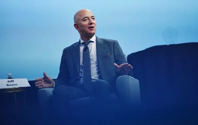 Blue Origin founder Jeff Bezos speaks after receiving the 2019 International Astronautical Federation (IAF) Excellence in Industry Award during the the 70th International Astronautical Congress at the Walter E. Washington Convention Center in Washington, DC on October 22, 2019. (Photo by MANDEL NGAN / AFP)