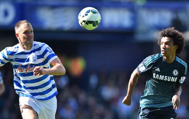 Queens Park Rangers&#8217; English defender Clint Hill (L) vies with Chelsea&#8217;s Brazilian midfielder Willian during the English Premier League football match between Queens Park Rangers and Chelsea at Loftus Road Stadium in London on April 12, 2015. AFP PHOTO / RESTRICTED TO EDITORIAL USE. NO USE WITH UNAUTHORIZED AUDIO, VIDEO, DATA, FIXTURE LISTS, CLUB/LEAGUE LOGOS [&hellip;]