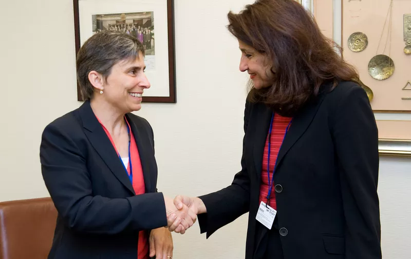 (R) Ms. Nemat Shafik, Deputy Managing Director of the International Monetary Fund (IMF), and (L) Her Excellency, Ms. Beatrice Maser, Ambassador, Head of Economic Cooperation and Development of Switzerland, shake hands after a signing ceremony for an agreement on SwitzerlandÕs contribution of $5 million to the IMFÕs multi-donor Topical Trust Fund on Tax Policy and Administration.  The signing was held during the 2011 IMF/World Bank Spring Meetings at IMF Headquarters April 17, 2011, in Washington, D.C.
 IMF Staff Photo/Michael Spilotro