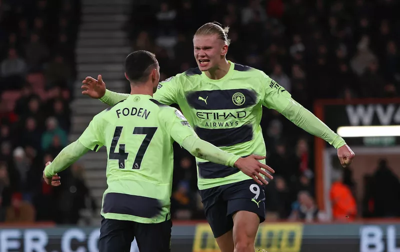 Football - 2022 / 2023 Premier League - AFC Bournemouth vs Manchester City - Vitality Stadium - Saturday 25th February 2023 Phil Foden of Manchester City celebrates his goal with Erling Haaland of Manchester City during the Premier League match at the Vitality Stadium Dean Court Bournemouth COLORSPORT / Shaun Boggust PUBLICATIONxNOTxINxUK