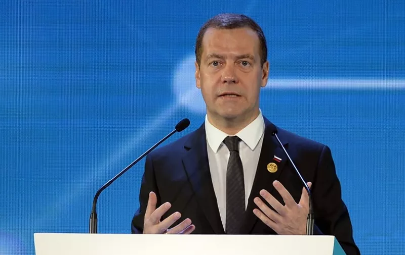 Russia's Prime Minister Dmitry Medvedev speaks during the Asia-Pacific Economic Cooperation (APEC) 2015 CEO Summit in Manila on November 18, 2015. Asia-Pacific leaders are meeting in Manila for a summit meant to forge trade unity but with the spotlight instead on a tense contest for territory in the South China Sea.    AFP PHOTO / POOL / Punit PARANJPE