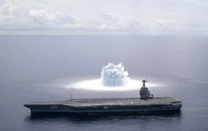 The aircraft carrier USS Gerald R. Ford (CVN 78) completes the first scheduled explosive event of Full Ship Shock Trials while underway in the Atlantic Ocean, June 18, 2021. The U.S. Navy conducts shock trials of new ship designs using live explosives to confirm that our warships can continue to meet demanding mission requirements under harsh conditions they might encounter in battle. (U.S. Navy photo by Mass Communication Specialist 3rd Class Riley B. McDowell)