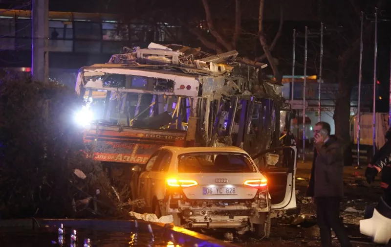 The wreckage of a bus and a car are pictured at the scene of a blast in Ankara on March 13, 2016.
At least 27 people were killed and 75 others wounded in a blast in the heart of the Turkish capital Ankara, local media reported, speaking of an attack. Ambulances rushed to the scene of the explosion on Kizilay square, a key hub in the city, and television pictures showed burnt-out vehicles including a bus.
 / AFP / EROL UCEM