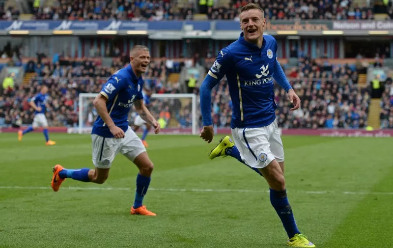 Leicester City's English striker Jamie Vardy (R) celebrates his coal during the English Premier League football match between Burnley and Leicester at Turf Moor in Burnley, north west England on April 25, 2015.    AFP PHOTO / OLI SCARFF

RESTRICTED TO EDITORIAL USE. No use with unauthorized audio, video, data, fixture lists, club/league logos or live services. Online in-match use limited to 45 images, no video emulation. No use in betting, games or single club/league/player publications.