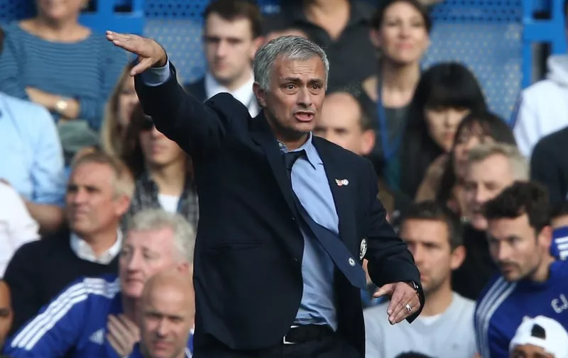Chelsea's Portuguese manager Jose Mourinho gestures during the English Premier League football match between Chelsea and Liverpool at Stamford Bridge in London on October 31, 2015. Liverpool won the game 3-1. AFP PHOTO / JUSTIN TALLIS 

RESTRICTED TO EDITORIAL USE. No use with unauthorized audio, video, data, fixture lists, club/league logos or 'live' services. Online in-match use limited to 75 images, no video emulation. No use in betting, games or single club/league/player publications.