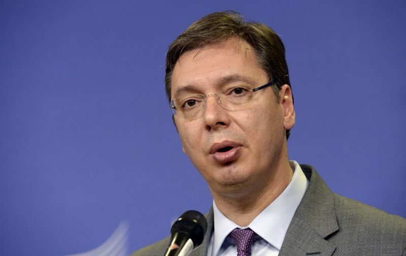 Serbian Prime Minister Aleksandar Vucic holds a press conference after an EU-Balkans mini summit at the EU headquarters in Brussels on October 25, 2015. European Union and Balkan leaders met to tackle the migrant crisis as Slovenia warned the bloc will "start falling apart" if it fails to take concrete action within weeks. AFP PHOTO / THIERRY CHARLIER / AFP / THIERRY CHARLIER
