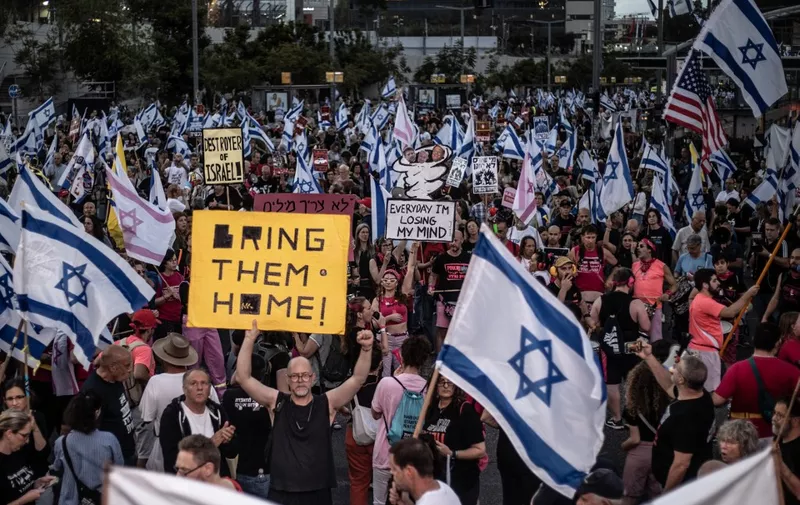 TEL AVIV, ISRAEL - MAY 11: Thousands of Israelis gather in Tel Aviv, demand a prisoner exchange agreement, early elections and the resignation of Prime Minister Benjamin Netanyahu's government on May 11, 2024. Demonstrators carrying Israeli flags chanted anti-government slogans. Mostafa Alkharouf / Anadolu (Photo by Mostafa Alkharouf / ANADOLU / Anadolu via AFP)