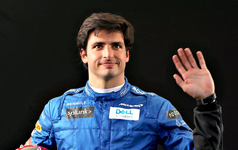 MELBOURNE, AUSTRALIA - MARCH 12: Carlos Sainz of Spain and McLaren F1 poses for a photo in the Paddock during previews ahead of the F1 Grand Prix of Australia at Melbourne Grand Prix Circuit on March 12, 2020 in Melbourne, Australia. (Photo by Robert Cianflone/Getty Images)