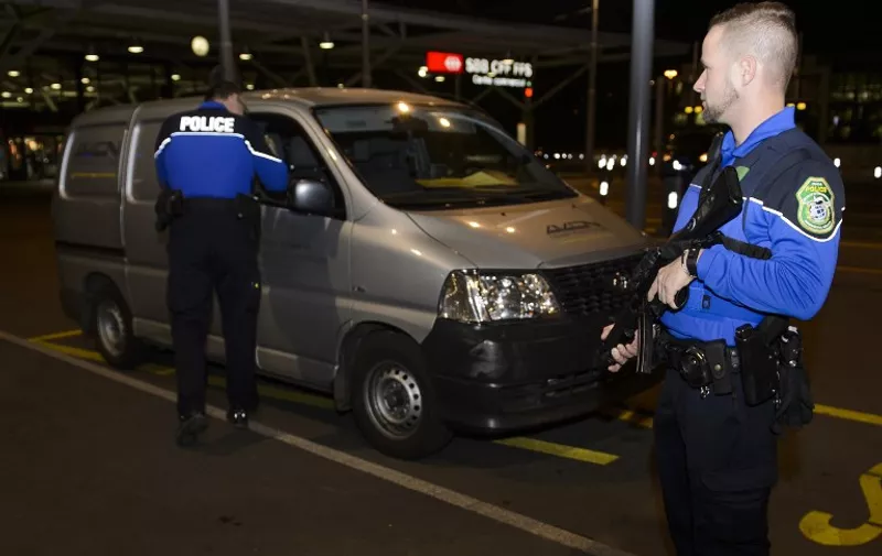 Security forces stop a van at the check vehicles arriving at Geneva's airoport on December 10, 2015, after police raised the alert level and searched the city for several suspected jihadists believed to have links to the Islamic State (IS) group, security sources said. 

Security services in the Canton of Geneva said they received information on December 9 from Swiss federal authorities about suspicious individuals in the Geneva area. The Tribune de Geneve, in an unconfirmed report, said the intelligence originally came from the United States.  / AFP / Richard Juilliart
