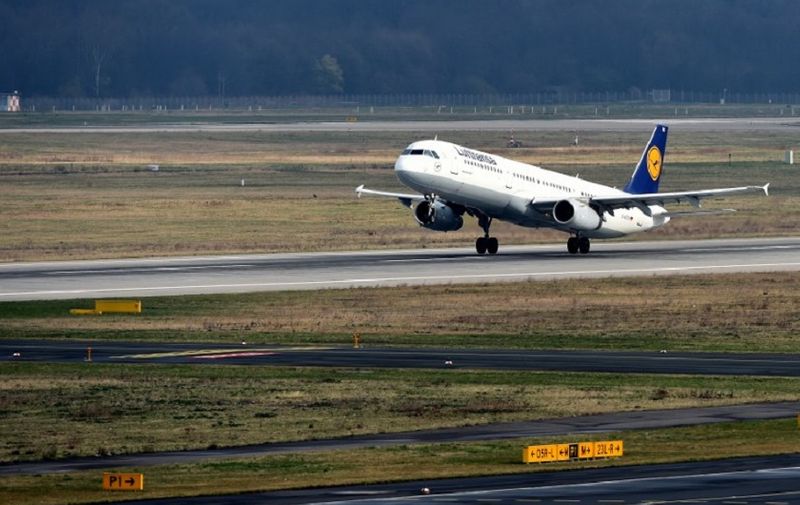 An Airbus plane of German airline Lufthansa carrying onboard relatives of the Germanwings plane crash victims takes off from the Duesseldorf airport on March 26, 2015 in Duesseldorf, western Germany, en route to Marseille. Lufthansa is taking relatives of the plane crash victims to the site where the Airbus A320 of its Germanwings subsidiary crashed in Southern France en route from Barcelona to Duesseldorf on March 24, 2015, killing all 150 people on board.   AFP PHOTO / PATRIK STOLLARZ / AFP / PATRIK STOLLARZ
