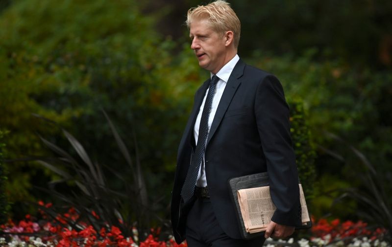 Britain's Minister of State for Universities Jo Johnson arrives to attend a meeting of the Cabinet at 10 Downing Street in central London on September 4, 2019. - British Prime Minister Boris Johnson lost a crucial parliamentary vote on his Brexit strategy on Tuesday after members of his own Conservative Party voted against him, opening the way for possible early elections. (Photo by DANIEL LEAL-OLIVAS / AFP)