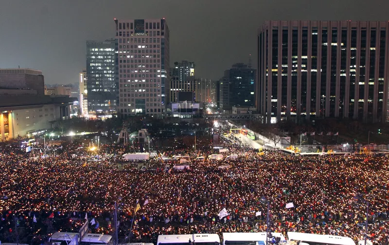 SEOUL, Nov. 26, 2016  -- People attend a rally demanding President Park Geun-hye to step down in central Seoul, South Korea, Nov. 26, 2016., Image: 306793721, License: Rights-managed, Restrictions: , Model Release: no, Credit line: Profimedia, Zuma Press - News