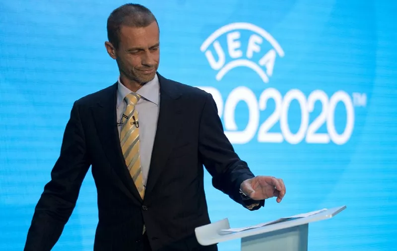UEFA president, Aleksander Ceferin speaks an event to launch the logo for the 2020 UEFA European Championship football tournament in London on September 21, 2016. - The 2020 UEFA European Championship will see matches hosted in 13 cities across Europe, with the semi-finals and final staged at Wembley Stadium in London in July 2020. (Photo by JUSTIN TALLIS / AFP)