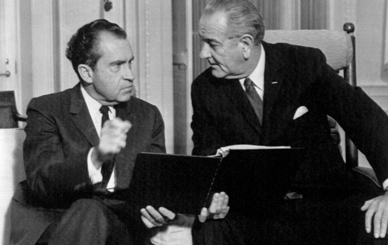 President elect Richard Nixon (left) and president Lyndon B. Johnson (right) confer on the orderly transition of power in the chief executive's White House Office, December 12, 1968, in Washington DC. Richard Nixon become the 37th President of the United States. / AFP PHOTO