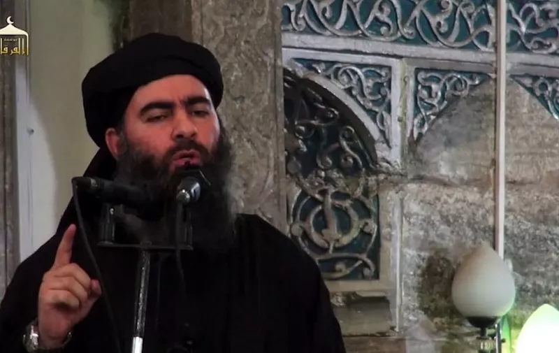 An image grab taken from a propaganda video released on July 5, 2014 by al-Furqan Media allegedly shows the leader of the Islamic State (IS) jihadist group, Abu Bakr al-Baghdadi, aka Caliph Ibrahim, adressing Muslim worshippers at a mosque in the militant-held northern Iraqi city of Mosul. Baghdadi, who on June 29 proclaimed a "caliphate" straddling Syria and Iraq, purportedly ordered all Muslims to obey him in the video released on social media.    AFP PHOTO / HO / AL-FURQAN MEDIA 
== RESTRICTED TO EDITORIAL USE - MANDATORY CREDIT "AFP PHOTO / HO / AL-FURQAN MEDIA " - NO MARKETING NO ADVERTISING CAMPAIGNS - DISTRIBUTED AS A SERVICE TO CLIENTS FROM ALTERNATIVE SOURCES, AFP IS NOT RESPONSIBLE FOR ANY DIGITAL ALTERATIONS TO THE PICTURE'S EDITORIAL CONTENT, DATE AND LOCATION WHICH CANNOT BE INDEPENDENTLY VERIFIED ==