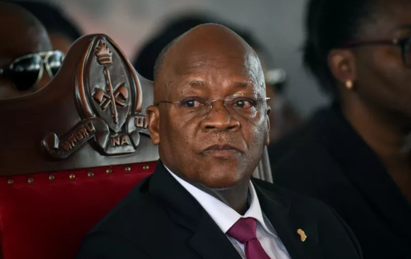 (FILES) In this file photo taken on July 29, 2020 Tanzanian President John Magufuli attends the burial ceremony of the former Tanzanian President Benjamin Mkapa has died age 81 at Mkapas home village in Lupaso, southern Tanzania. - Tanzania's opposition has demanded to know the whereabouts of President John Magufuli, who has not been seen in public in almost two weeks, raising concerns about his health.
Magufuli's absence has led to a flurry of rumours on social media, with the hashtag #Pray4Magufuli trending in neighbouring Kenya on Wednesday, with many speculating he may have Covid-19. (Photo by STR / AFP)