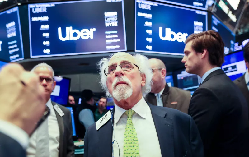 (190510) -- NEW YORK, May 10, 2019 () -- Traders work at the New York Stock Exchange during the initial public offering (IPO) of Uber Technologies Inc., in New York, the United States, May 10, 2019. U.S. ride hailing company Uber Technologies Inc. began trading on the NYSE on Friday., Image: 432364646, License: Rights-managed, Restrictions: WORLD RIGHTS excluding China - Fee Payable Upon Reproduction - For queries contact Avalon.red - sales@avalon.red London: +44 (0) 20 7421 6000 Los Angeles: +1 (310) 822 0419 Berlin: +49 (0) 30 76 212 251, Model Release: no, Credit line: Profimedia, UPPA News