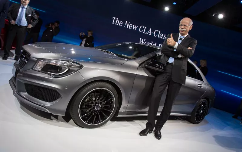 Mercedes Chairman of the Board Dr. Dieter Zetsche poses for a photo at the launch of the company's CLA class car on the eve of the 2013 North American International Auto Show in Detroit, Michigan, January 13, 2013.    AFP PHOTO / Geoff ROBINS        (Photo credit should read GEOFF ROBINS/AFP/Getty Images)