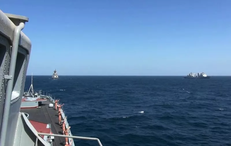 6747706 25.01.2022 In this handout video grab released by the Russian Defence Ministry, a picture shows the Peaceful Sea -2022 naval drills are held in the western part of the Arabian Sea. The Russian cruiser Varyag, the Russian destroyer Admiral Tributs, Russian vessel Boris Butoma of the Russian Pacific Fleet and Chinese destroyer Urumqi, and the Chinese ship Taihu took part in the drills. Editorial use only, no archive, no commercial use.navy, North Pacific Fleet, defense Russian Defence Ministry (Photo by Russian Defence Ministry / Sputnik via AFP)