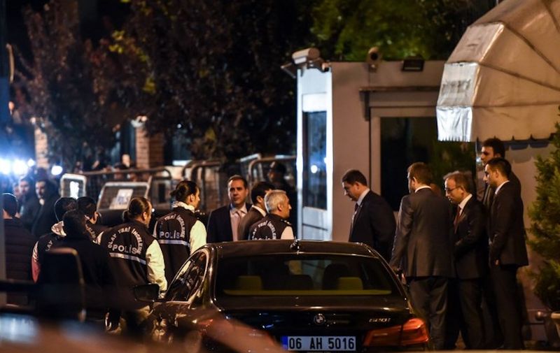 Turkish police and other officials enter Saudi Arabia's consulate in Istanbul on October 15, 2018 to search the premises in the investigation over missing Saudi journalist Jamal Khashoggi. - Uniformed Turkish police and other officials in suits believed to be prosecutors went inside the consulate after receiving agreement from Riyadh to conduct the search. Khashoggi has not been seen since entering the consulate on October 2. (Photo by BULENT KILIC / AFP)
