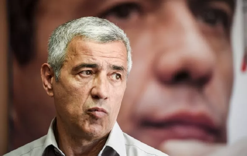 A picture taken on May 5, 2017 shows the leading Kosovo Serb politician Oliver Ivanovic during an interview for the AFP in his office in north Mitrovica.  
Ivanovic was killed in a brazen drive-by shooting on January 16, 2018, in the north of Mitrovica. The assassination of Ivanovic - who was facing a retrial on war crimes charges over the 1990s Kosovo conflict - occurred on the very day that Belgrade and Pristina resumed talks on normalising ties after a hiatus of more than a year.  / AFP PHOTO / Armend NIMANI