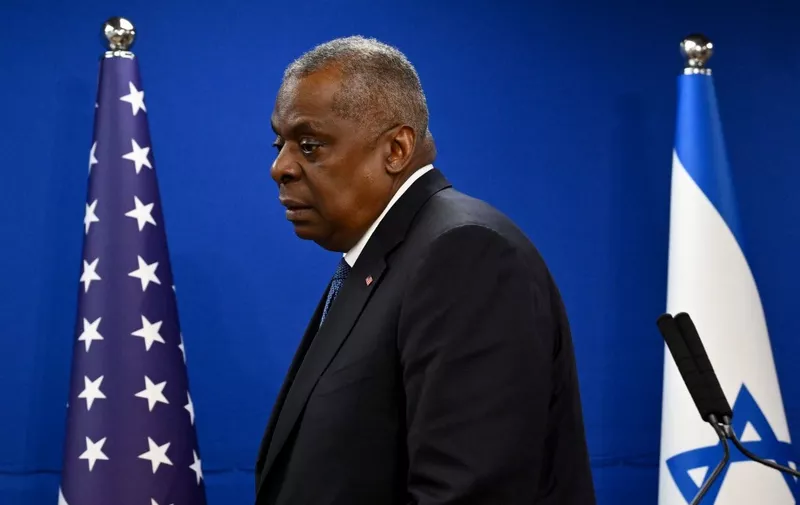 (FILES) US Secretary of Defence Lloyd Austin gives a joint press conference with Israel's defence minister, in Tel Aviv on December 18, 2023. US Defense Secretary Lloyd Austin was hospitalized earlier this week due to complications from a medical procedure, the Pentagon said January 5, 2024 at a time when Washington is facing a growing crisis in the Middle East. (Photo by Alberto PIZZOLI / AFP)