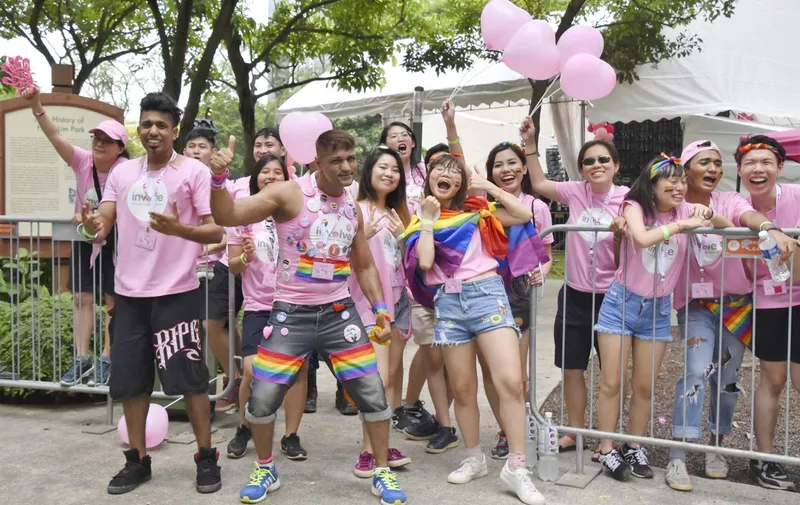Supporters of Singapore's lesbian, gay, bisexual and transgender movement attend the 10th annual gay pride event in downtown Singapore on July 21, 2018. (Kyodo)
==Kyodo,Image: 378816257, License: Rights-managed, Restrictions: , Model Release: no