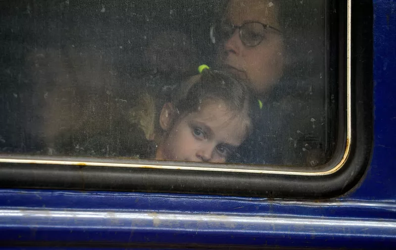Woman and child are seen on an evacuation train to the western region of Ukraine. 
The European Union has put in place a temporary protection mechanism for Ukrainian refugees who were forced to leave Ukraine due to the Russian invasion. Refugees were allowed to legally live and work in EU countries for up to three years. In eight days, 1.25 million people left Ukraine. In total, representatives of 138 nationalities crossed the border of Ukraine with neighboring countries during the war.
Refugees at train station in Kyiv, Poland - 04 Mar 2022,Image: 666419134, License: Rights-managed, Restrictions: , Model Release: no, Credit line: Profimedia