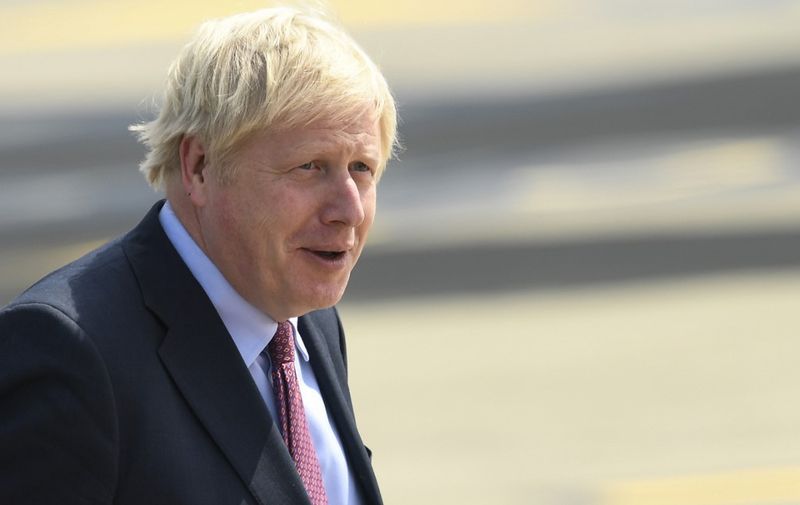 Britain's Prime Minister Boris Johnson lands at the Biarritz Pays Basque Airport in Biarritz, south-west France on August 24, 2019, on the first day of the annual G7 Summit attended by the leaders of the world's seven richest democracies, Britain, Canada, France, Germany, Italy, Japan and the United States. (Photo by Bertrand GUAY / AFP)