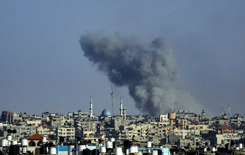 Smoke billows following Israeli bombardment in Rafah, in the southern Gaza Strip, on May 25, 2024, amid the ongoing conflict between Israel and the Palestinian militant group Hamas. (Photo by Eyad BABA / AFP)