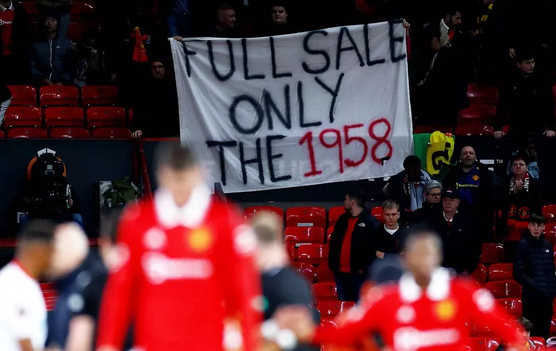 Soccer Football - Europa League - Quarter Final - First Leg - Manchester United v Sevilla - Old Trafford, Manchester, Britain - April 13, 2023  Manchester United fans display a banner after the match Action Images via Reuters/Lee Smith