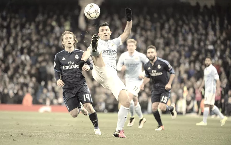 modric (luka) of Real Madrid and aguero (sergio) of Manchester City in action during during the UEFA Champions League semi-final first leg football match between Manchester City and Real Madrid at the Etihad Stadium in Manchester, England, on April 26, 2016.