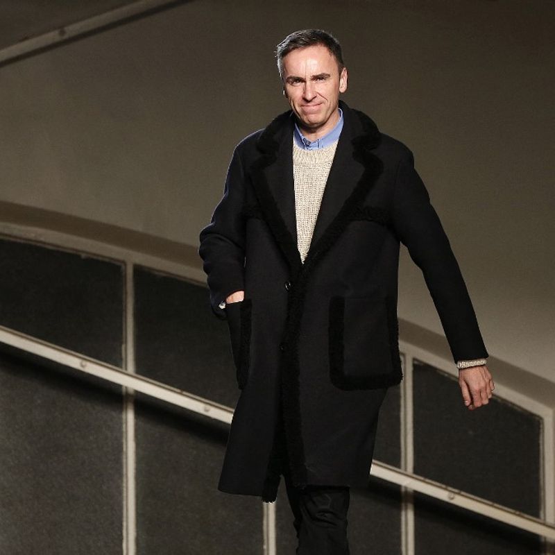 Belgian designer Raf Simons acknowledges the crowd at the end of his fashion show during the men's Fashion Week for the 2016-2017 Fall/Winter collection in Paris on January 20, 2016. (Photo by FRANCOIS GUILLOT / AFP)