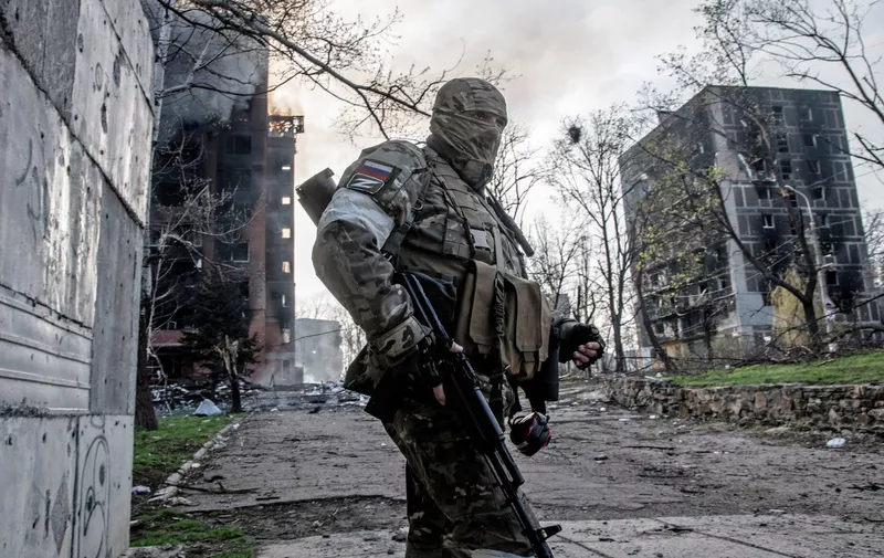 A Russian soldier stands near a burning apartment block in central Mariupol. as the eastern offensive across Donbas continues.
Donbas fighting, Ukraine - 18 Apr 2022,Image: 684857961, License: Rights-managed, Restrictions: , Model Release: no, Credit line: Profimedia