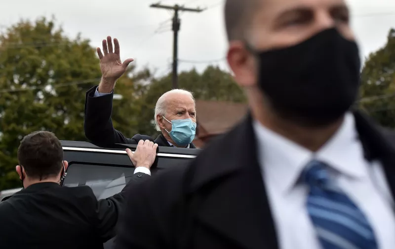 Joe Biden waves goodbye while entering his vehicle in Scranton on Tuesday. 
Joe Biden visits the Union hall in Scranton Pa. on election day.
Biden in Scranton, US - 03 Nov 2020,Image: 567201932, License: Rights-managed, Restrictions: , Model Release: no