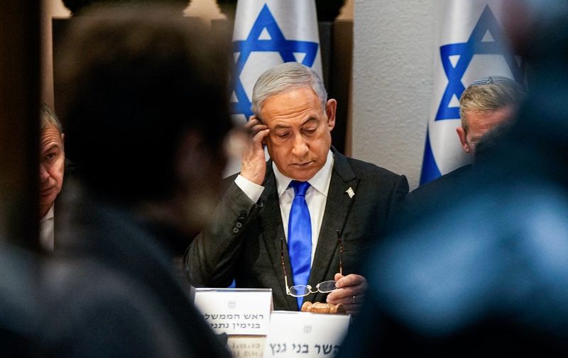 Israel's Prime Minister Benjamin Netanyahu chairs a cabinet meeting at the Kirya military base, which houses the Israeli Ministry of Defence, in Tel Aviv on December 24, 2023. (Photo by Ohad Zwigenberg / POOL / AFP)