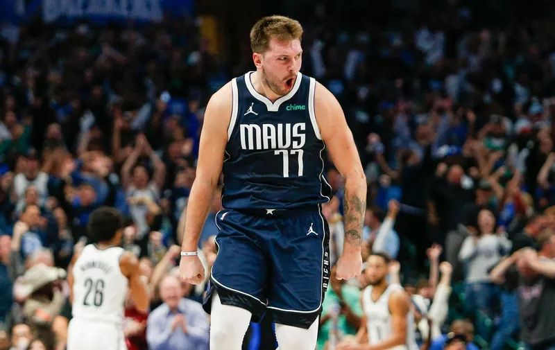 Oct 27, 2023; Dallas, Texas, USA; Dallas Mavericks guard Luka Doncic (77) reacts after hitting a go ahead 3-pointer late in the fourth quarter against the Brooklyn Nets at American Airlines Center. Mandatory Credit: Andrew Dieb-USA TODAY Sports