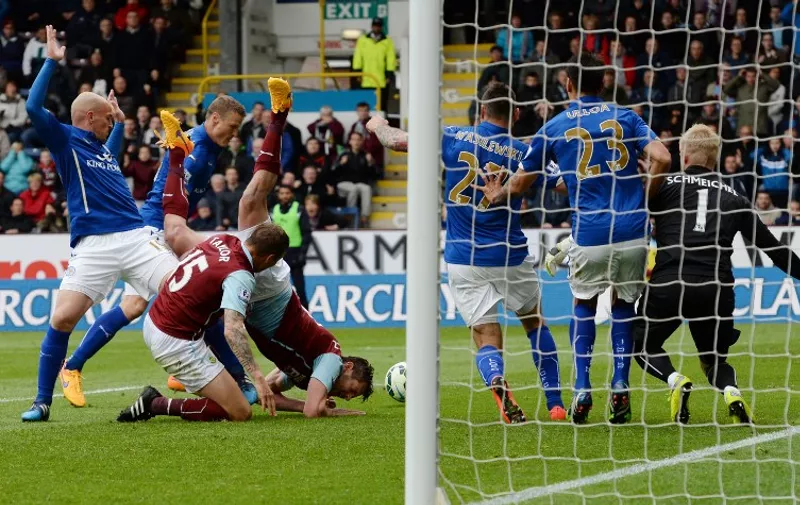Burnley&#8217;s English striker Lukas Jutkiewicz falls over Burnley&#8217;s English midfielder Matthew Taylor in an attempt to score during the English Premier League football match between Burnley and Leicester at Turf Moor in Burnley, north west England on April 25, 2015. AFP PHOTO / RESTRICTED TO EDITORIAL USE. No use with unauthorized audio, video, data, fixture [&hellip;]
